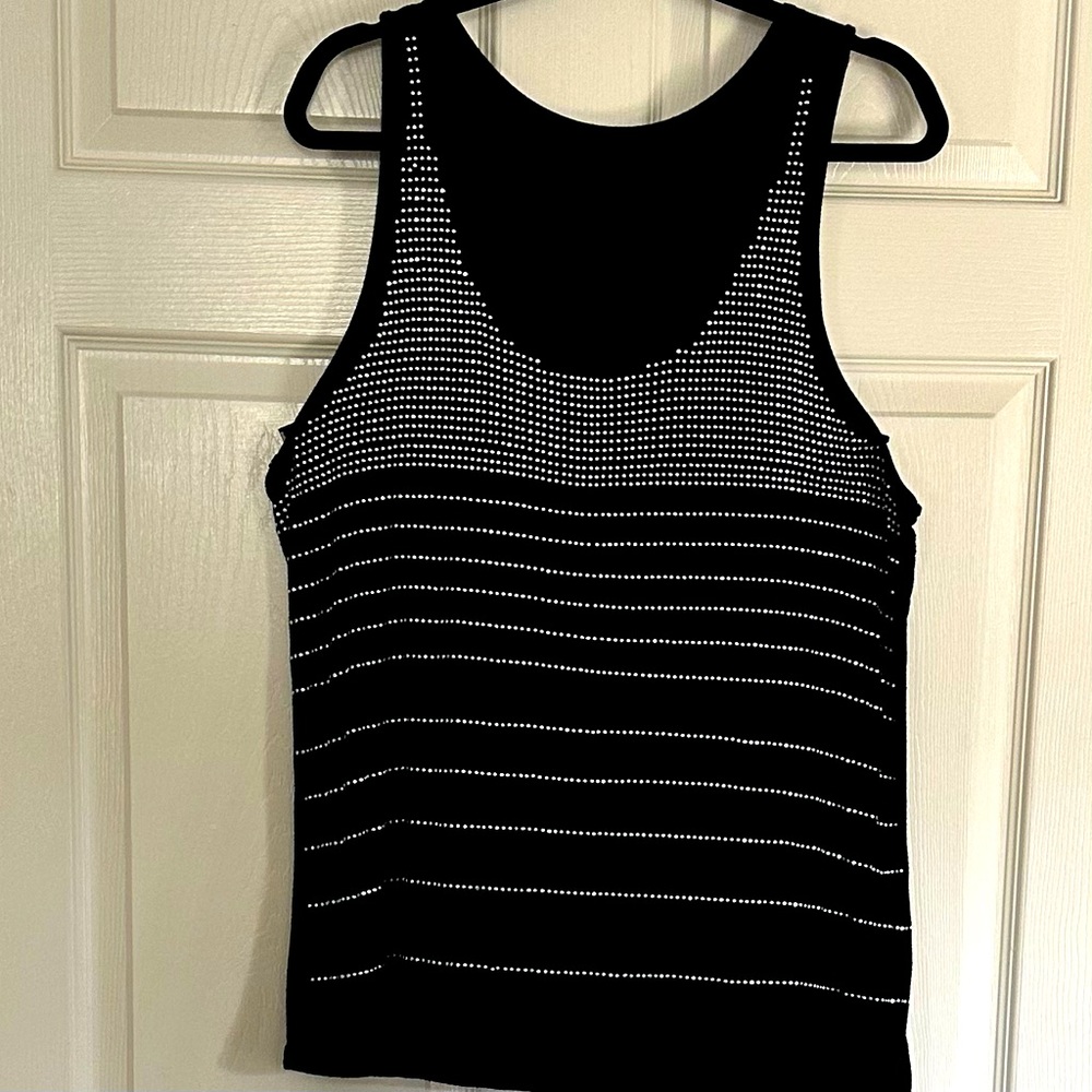 Black tank top w/ silver studs. Stunning under blazer, jean jacket, or alone!